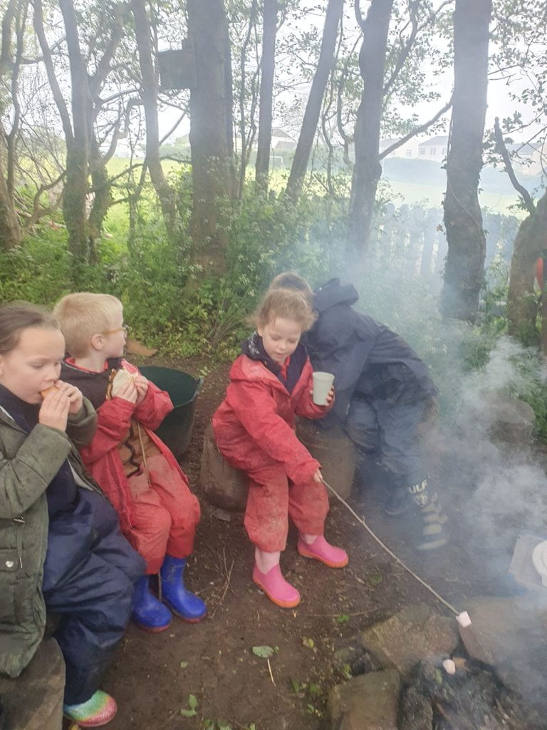 Campfire s’mores and pizza in the rain – Village Schools Partnership Blog